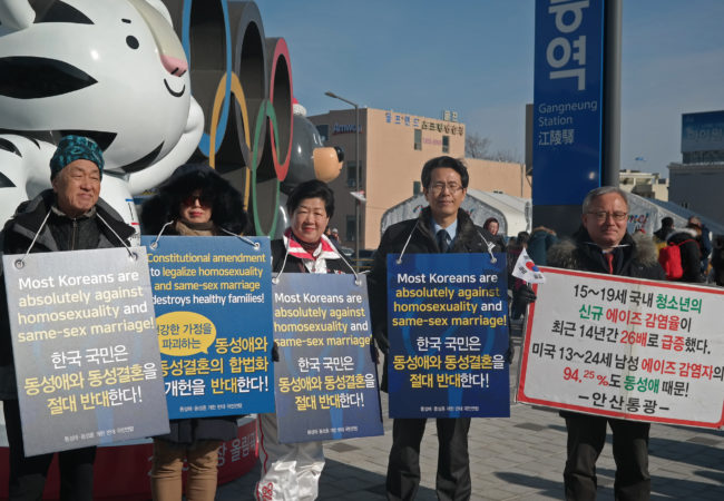 On Feb. 21, 2018, anti-LGBT protesters stand in front of the Gangneung station, a port to several Olympic venues such as ice hockey and figure skating. (Jisoo Hong/The GroundTruth Project)