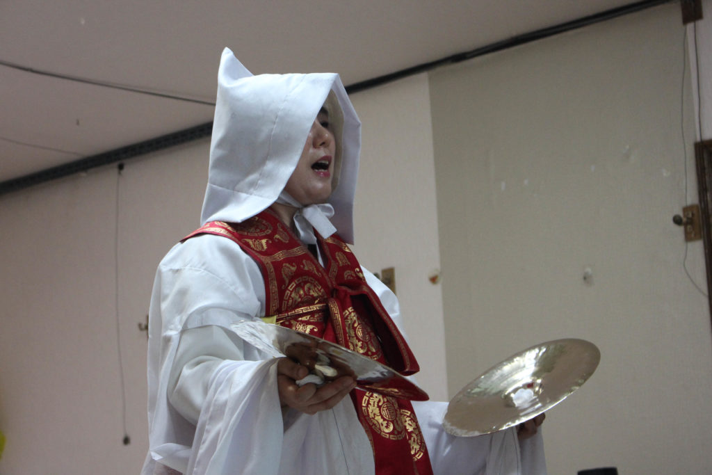 The chants are sung in an ancient form of Korean language, making it difficult even for Koreans to comprehend entirely. (Miranda Mazariegos/GroundTruth)