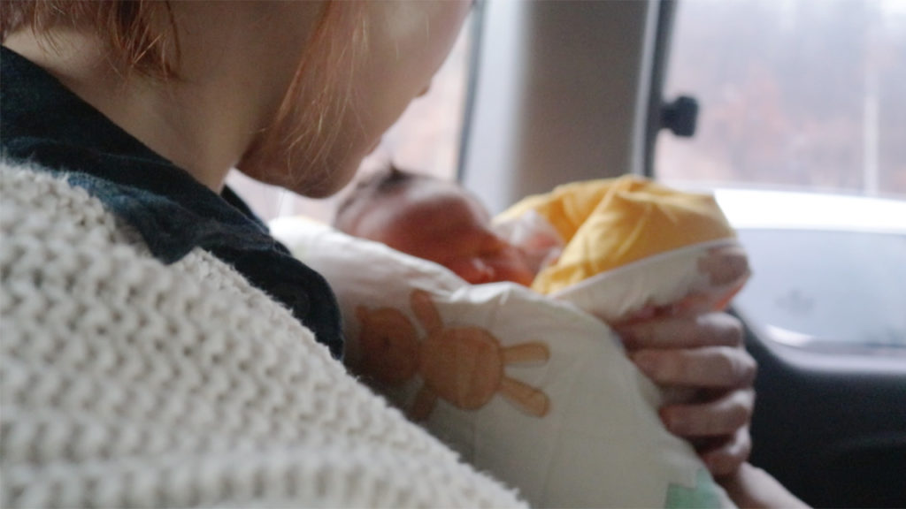 Because of the emphasis on family lineage, Korean parents are unenthusiastic about adoption, and orphans are socially stigmatized. Pictured, a volunteer holds a baby abandoned at a church's "baby box." (Paulina Cachero/GroundTruth)