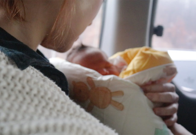 Because of the emphasis on family lineage, Korean parents are unenthusiastic about adoption, and orphans are socially stigmatized. Pictured, a volunteer holds a baby abandoned at a church's "baby box." (Paulina Cachero/GroundTruth)