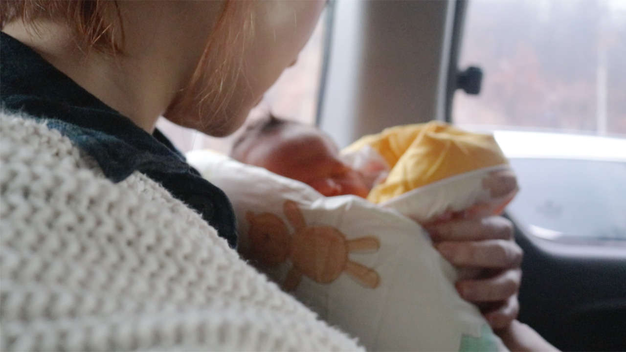 Because of the emphasis on family lineage, Korean parents are unenthusiastic about adoption, and orphans are socially stigmatized. Pictured, a volunteer holds a baby abandoned at a church's "baby box." (Paulina Cachero/GroundTruth)