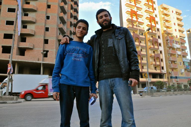 Ahmed and his younger brother, Omar, pictured in 2013. Omar has since disappeared. His family doesn't know where he is, although he calls every two weeks or so. (Lauren Bohn/GroundTruth)