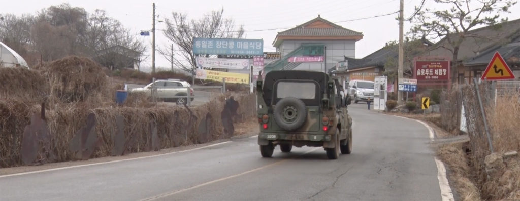 Military vehicles are among the sights seen in Tongil Chon, a South Korean village on the demilitarized zone.