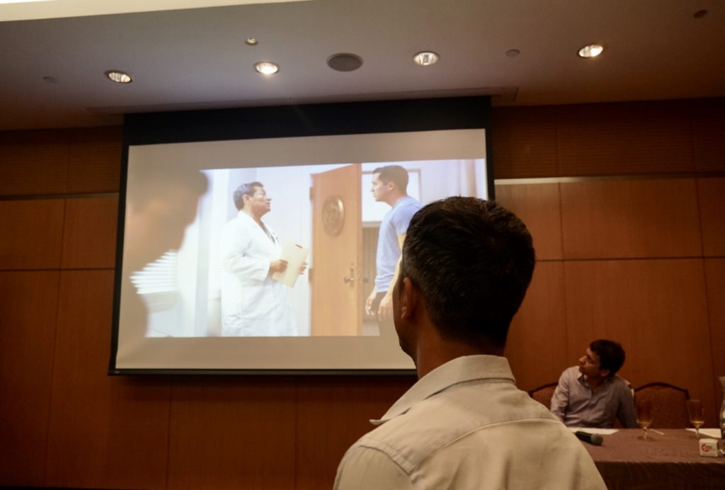 Rajan Parajuli, the Nepali representative for the International NGO Population Media Center, shows part of a TV drama used to change societal norms around child marriage. (Photo by Lucy Lyons/GroundTruth)