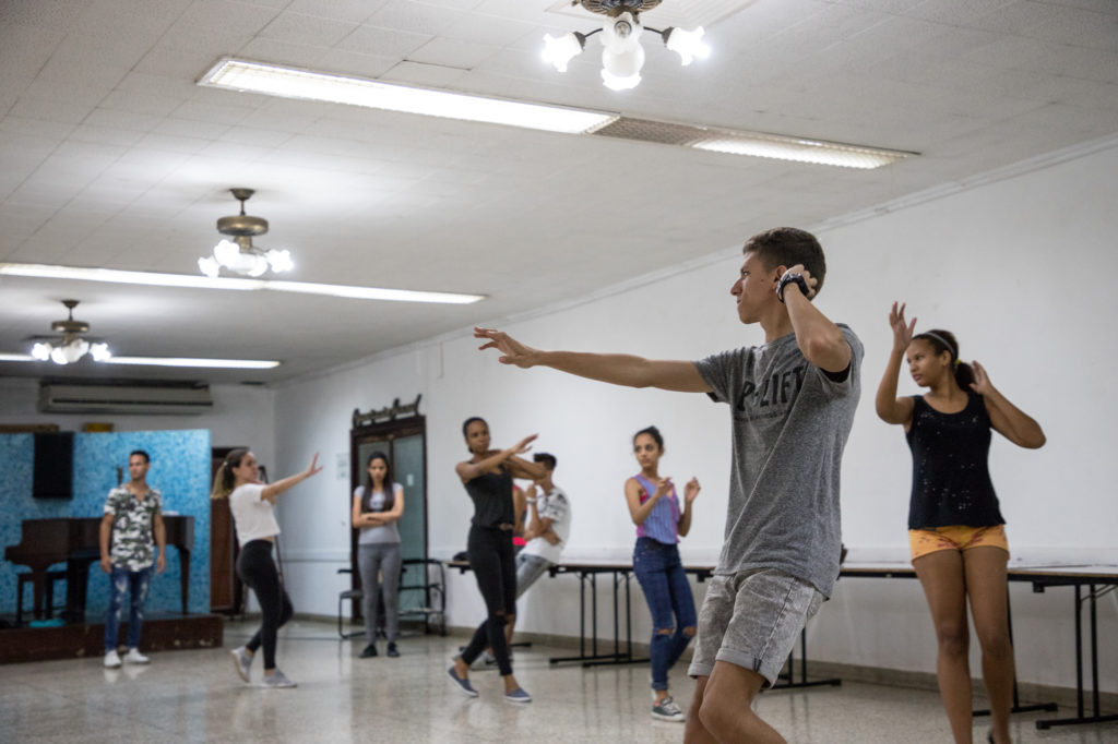 Abel Hernandez Eskenazi, front right, dances with other members of the youth organization at their weekly dance group May 14. Eskenazi, 17, has been leading religious services since his Bar Mitzvah four years ago. (Photo by Riley Robinson/The GroundTruth Project)
