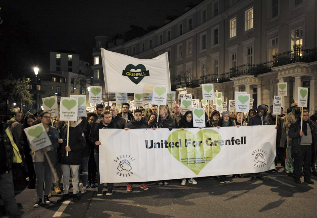 Justice For Grenfell demonstrators walked through Kensington's High Street, and the affluent neighborhoods bordering North Kensington, 10 months after the Grenfell fire.