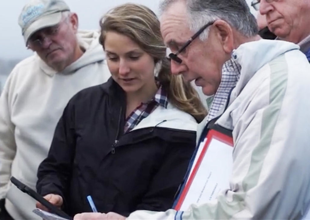 Screenshot from a video featuring Anna Mercer, head of the Commercial Fisheries Research Foundation, with fishermen participating in the Shelf Research Fleet. (Photo by CFRF) 