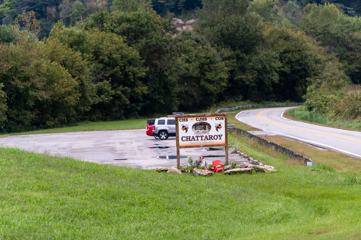 A sign greets visitors to Chattaroy, Oct. 2, 2018, in Mingo County, W.Va. CREDIT JESSE WRIGHT / WEST VIRGINIA PUBLIC BROADCASTING