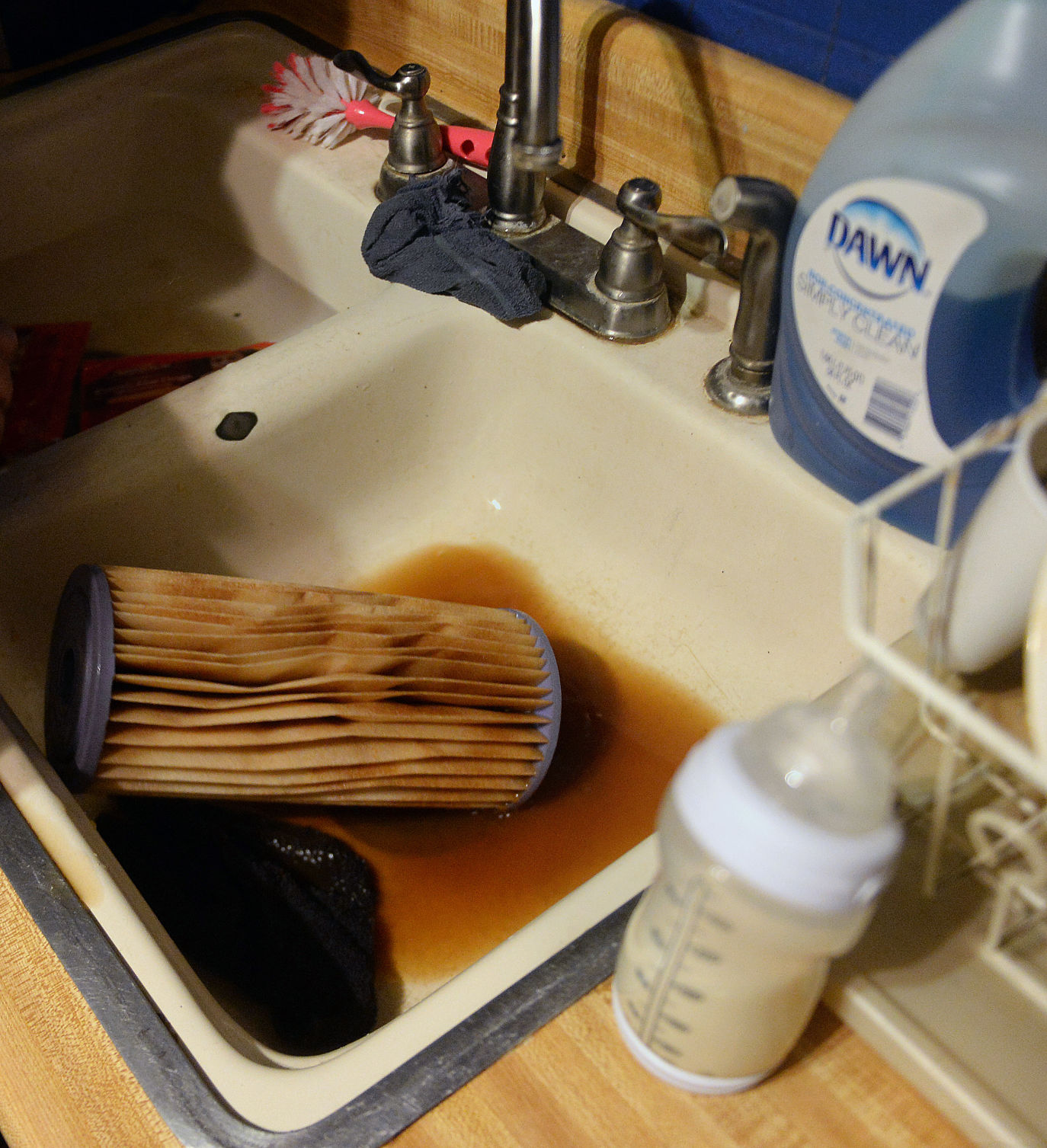 Chris and Tina Coleman installed filters on their water system after years of questionable service. This filter has had water running through it for less than two weeks. The Colemans spend about $100 a month on the filters, and still don't drink the water that comes out of their faucets. (Photo by F. Brian Ferguson | Gazette-Mail)