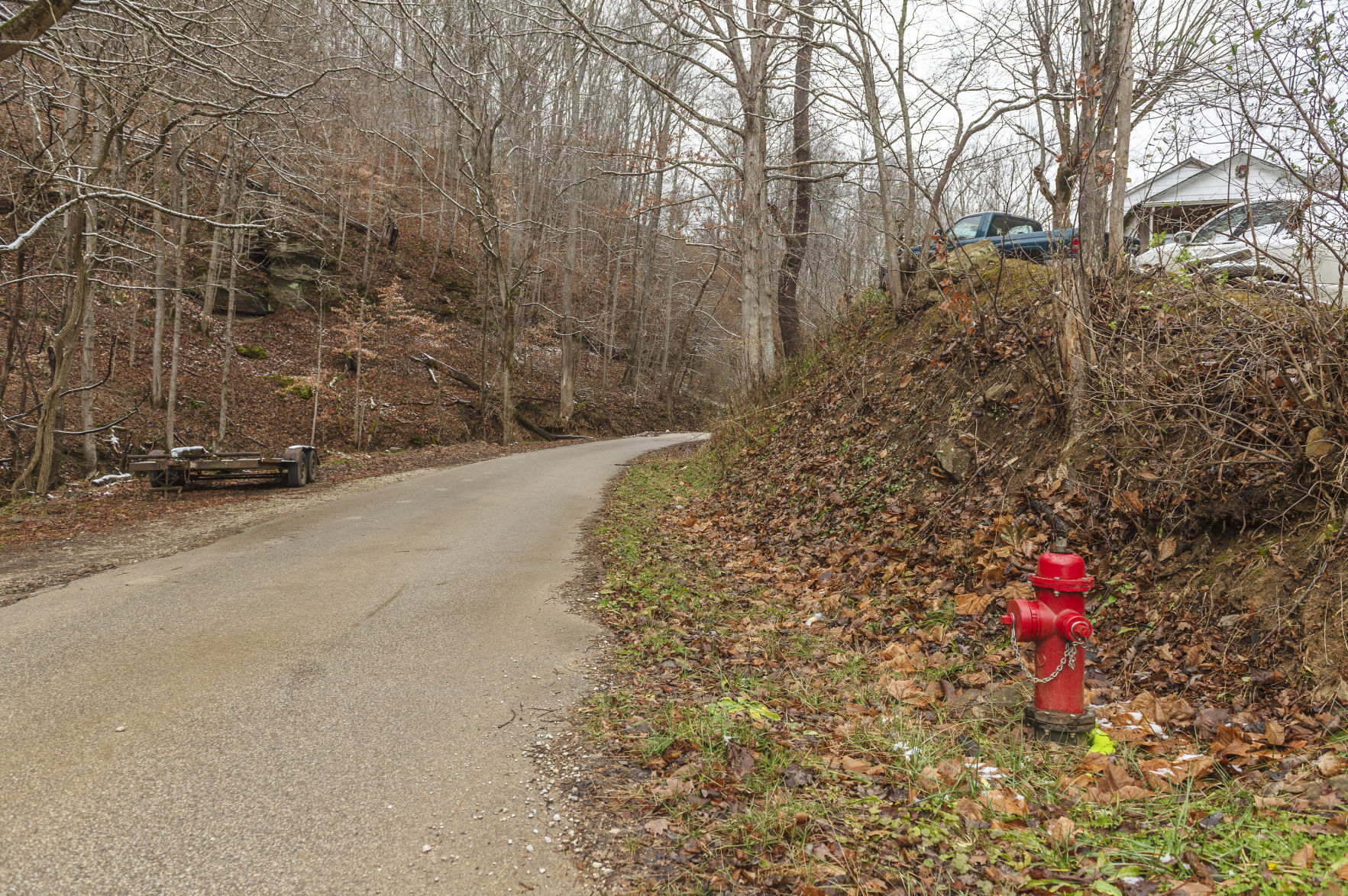 A fire hydrant off of Harless Fork Road in Branchland, Lincoln County, marks the end of Branchland-Midkiff Public Service District's water lines. Allen Adkins, who lives one tenth of a mile up from the hydrant, has been petitioning since 2013 to get water lines extended to his home. (Photo by Craig Hudson | Gazette-Mail)