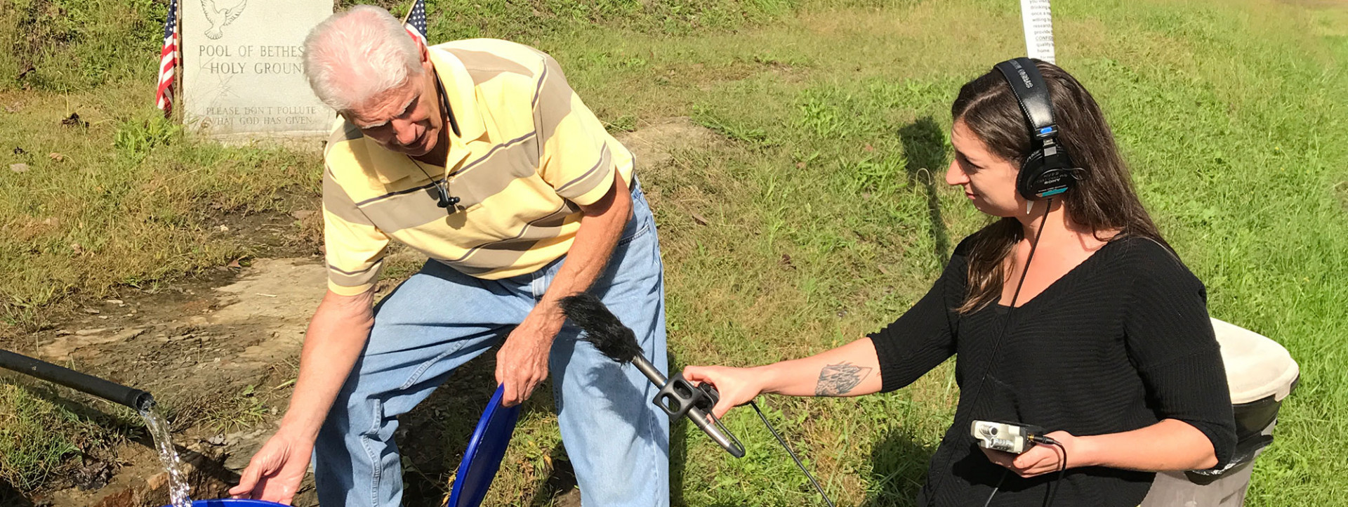 Molly Born conducting an interview on water access in southern West Virginia. (Photo by Report for America/GroundTruth)