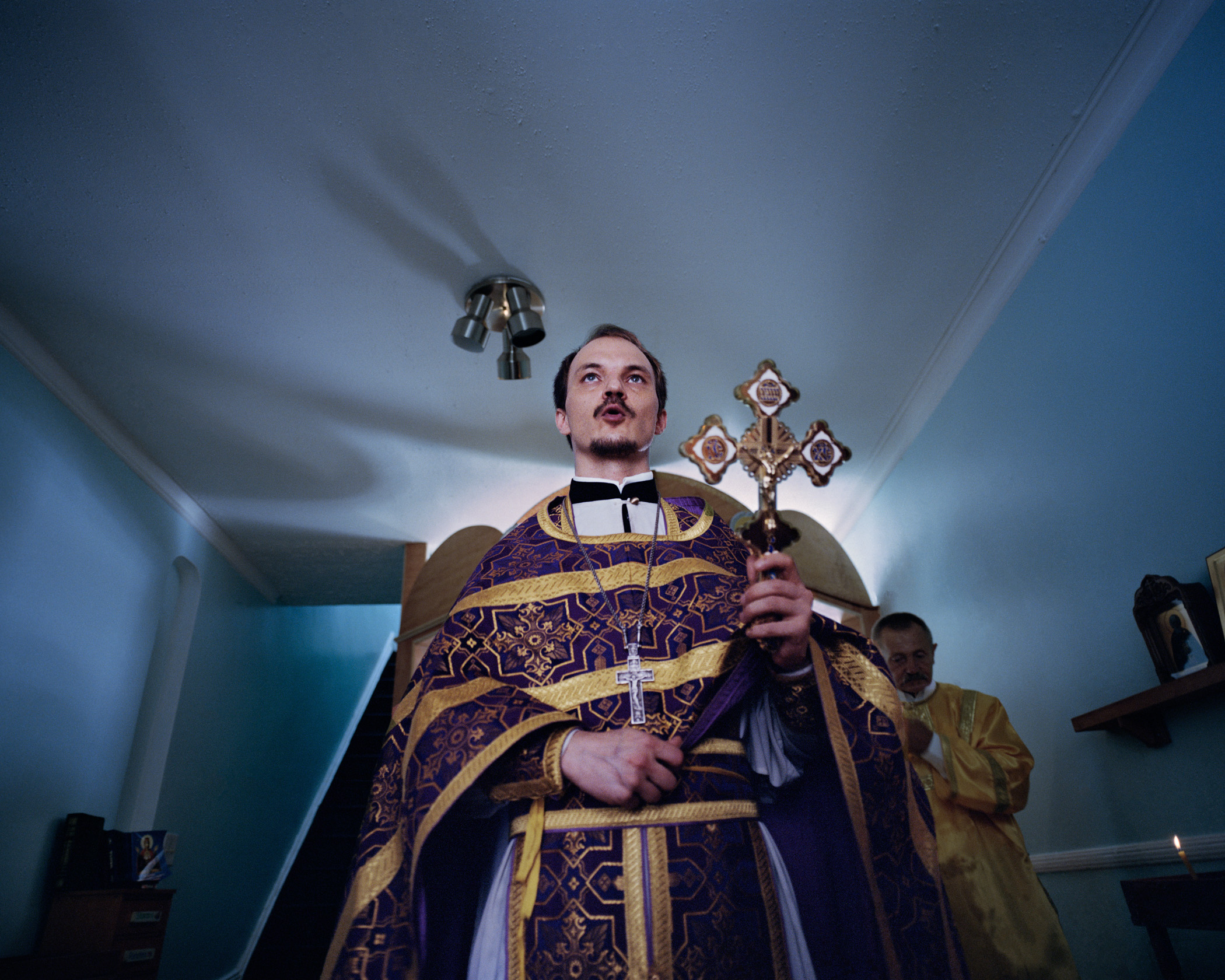 Father Nikodim, sanctifying the chapel built by recovering addicts and current residents of House of Labor and Love. (Photo by Alexey Yurenev/GroundTruth)